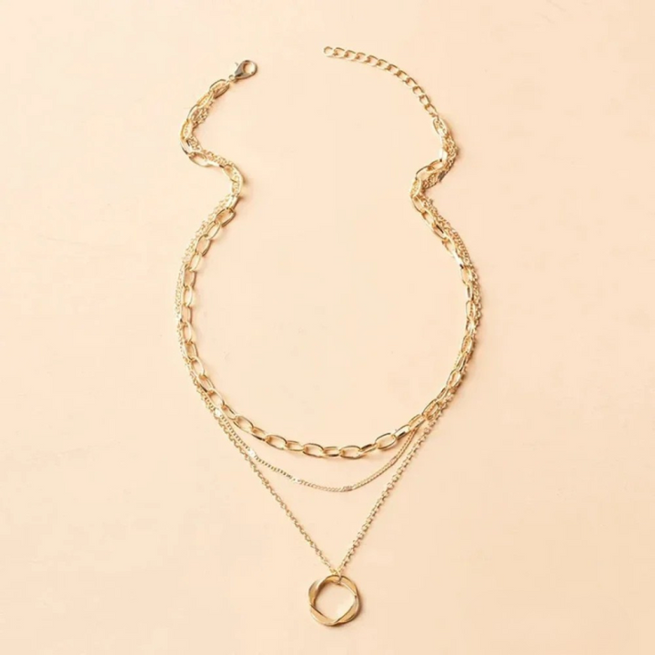 Collier chaîne large dorée – pendentif rond statement