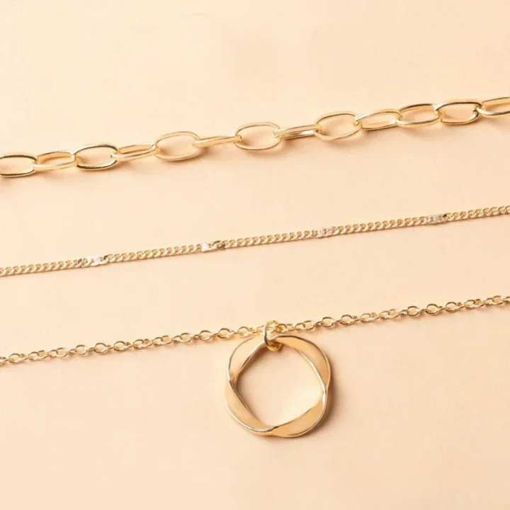 Collier chaîne large dorée – pendentif rond statement
