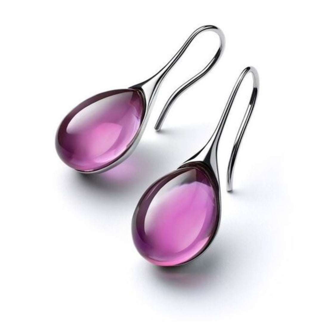 Boucles goutte œil de chat – éclat doux & silhouette épurée