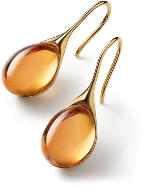 Boucles goutte œil de chat – éclat doux & silhouette épurée