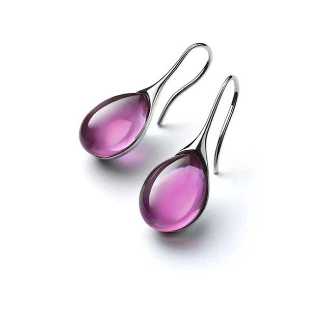 Boucles goutte œil de chat – éclat doux & silhouette épurée