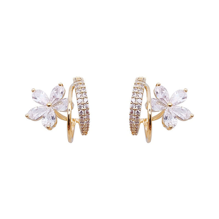 Boucles d'oreilles florales en or avec zirconia scintillant